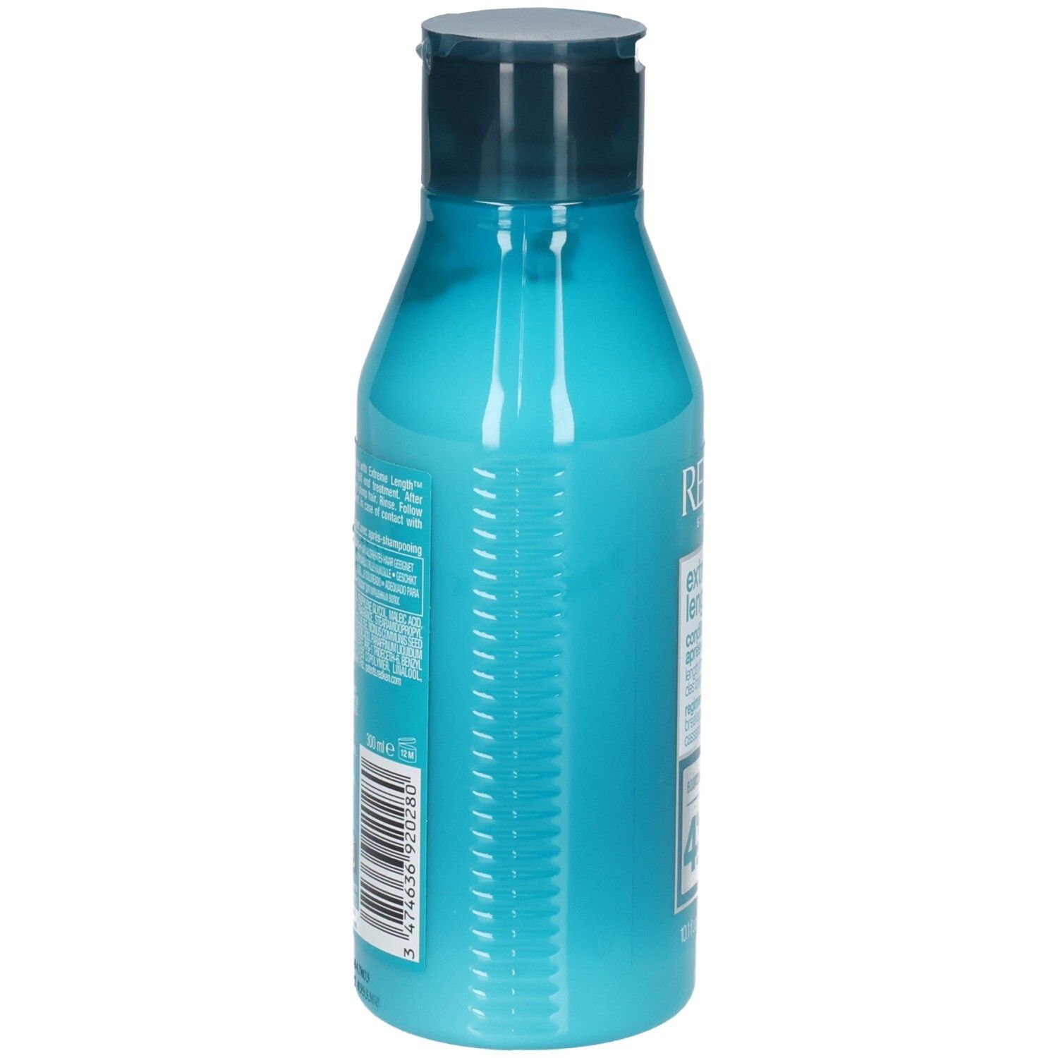 Dos d'une bouteille turquoise avec bouchon bleu foncé. Code-barres et informations textuelles. Contient REDKEN Extreme Length Conditioner.