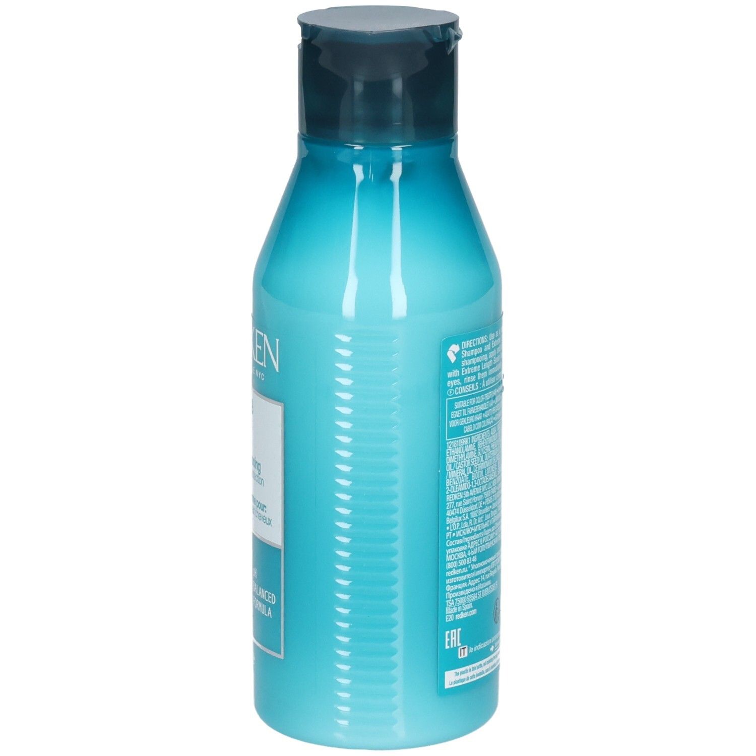 Côté d'une bouteille turquoise avec bouchon bleu foncé. Informations textuelles. Contient REDKEN Extreme Length Conditioner.
