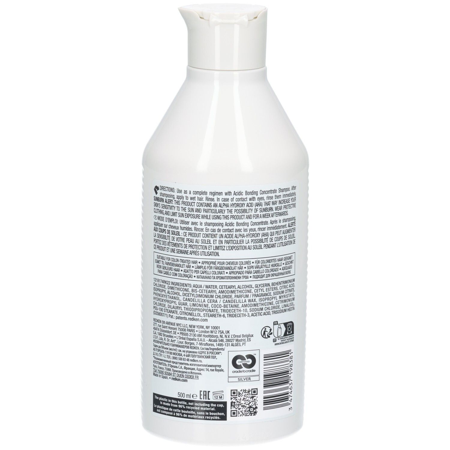 Bouteille blanche de revitalisant. Dos avec texte. Inscriptions: REDKEN, acidic bonding concentrate, 500ml.
