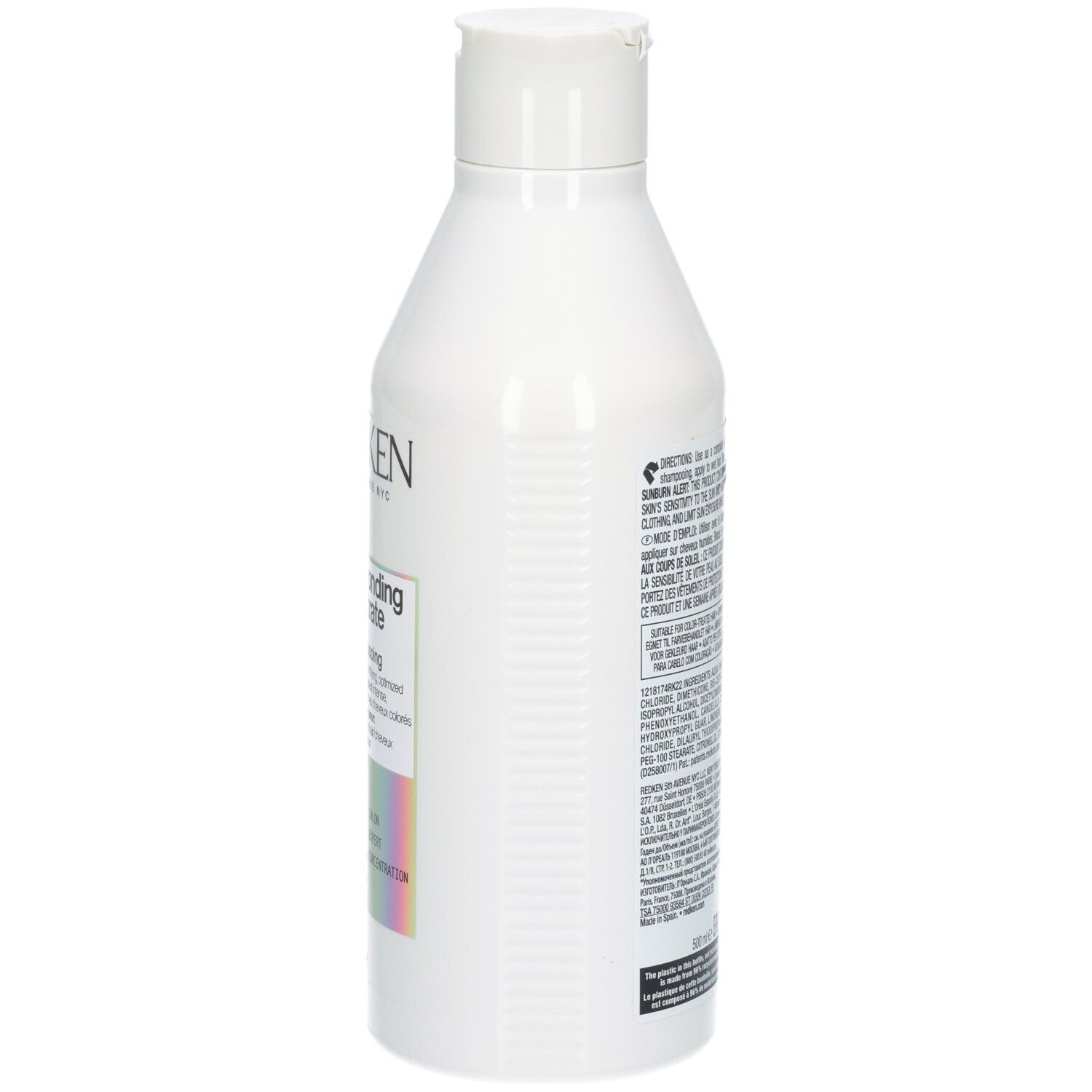 Bouteille blanche de revitalisant. Dos avec texte. Inscriptions: REDKEN, acidic bonding concentrate, 500ml.