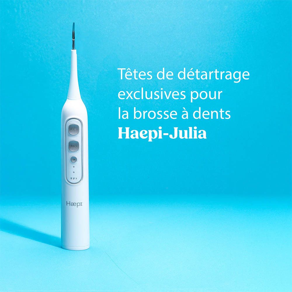 Brosse à dents électrique blanche avec embouts. Marque Haepi. Texte: Embouts exclusifs pour brosse à dents.