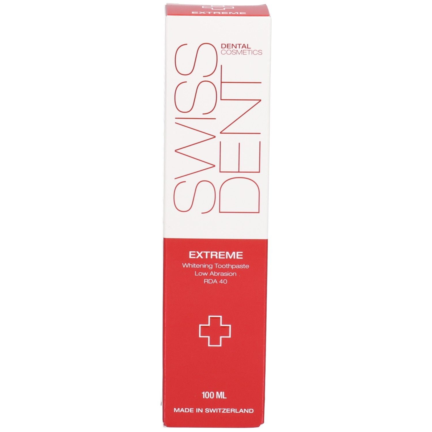 Boîte, blanc et rouge. Inscription SWISS DENT, EXTREME, Whitening Toothpaste. Croix rouge. 100 ml. Fabriqué en Suisse.