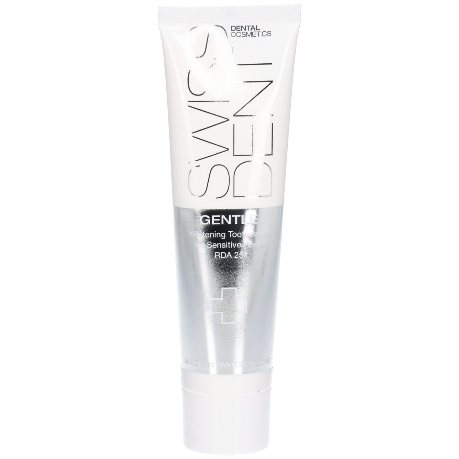 Tube de dentifrice blanche et argentée. Inscriptions: SWISSDENT, GENTLE, Whitening Toothpaste, RDA 25.