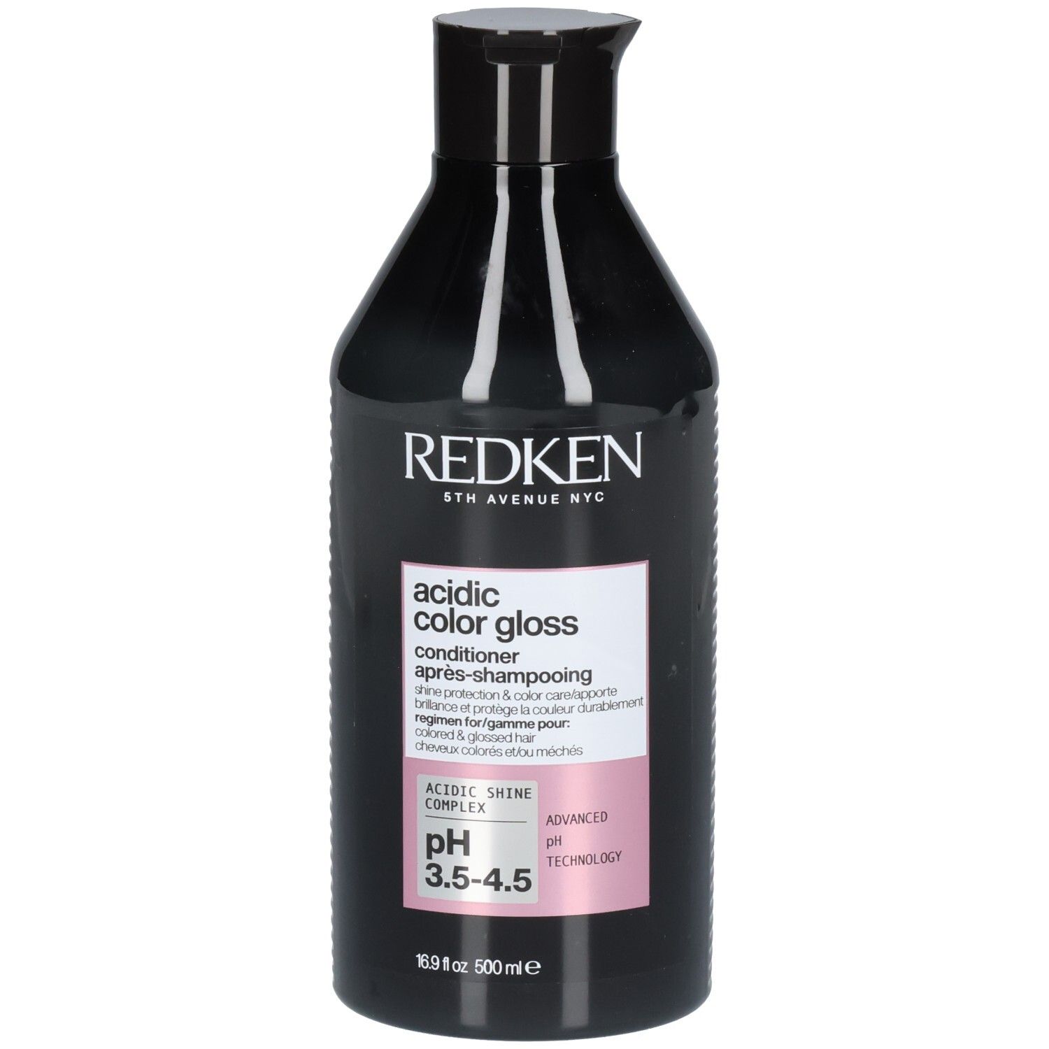 Flacon noir avec étiquette. Inscription: REDKEN, acidic color gloss, conditioner. Accents roses et argentés.