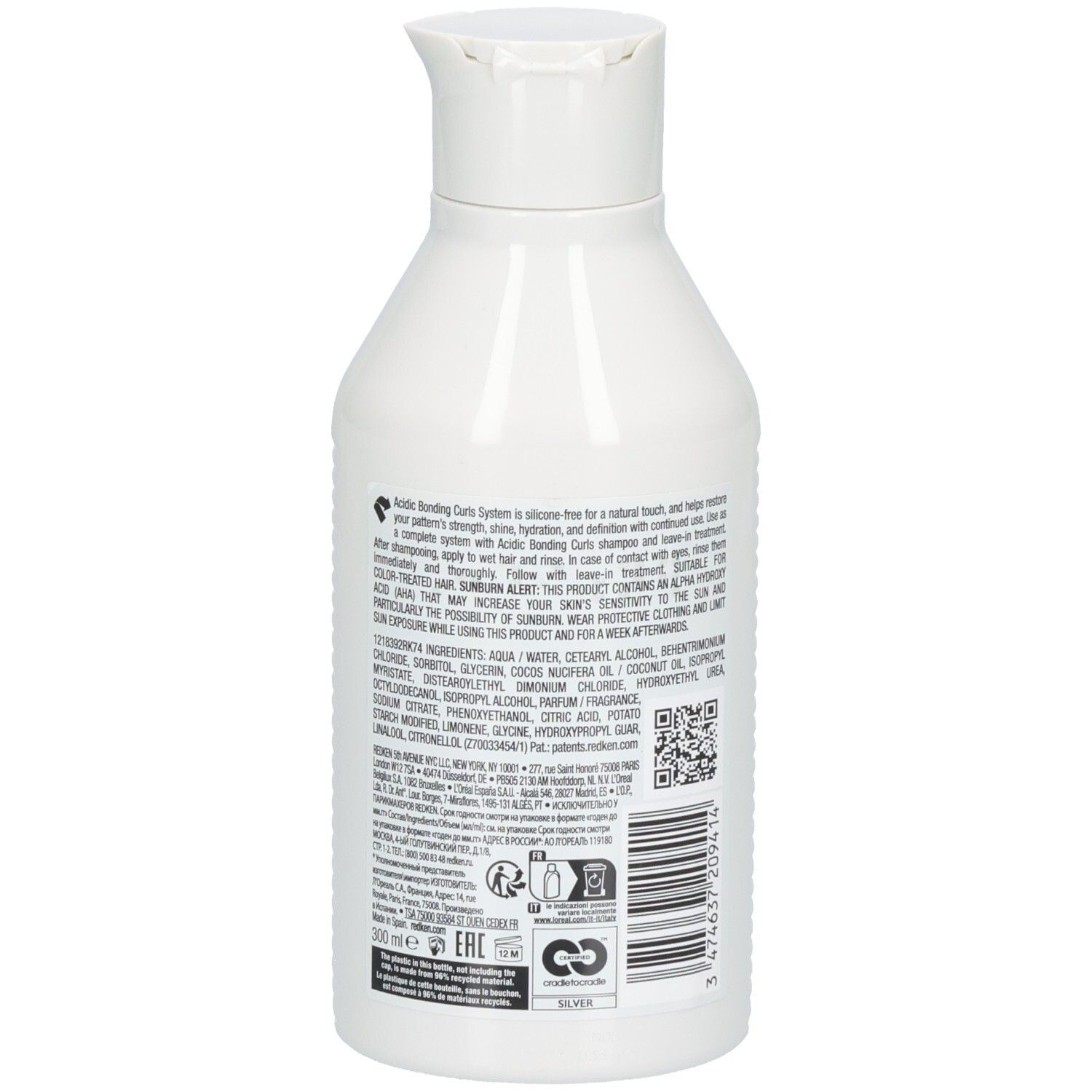 Dos du flacon blanc Redken Acidic Bonding Curls Conditioner. Contient ingrédients, code QR et symboles de recyclage.