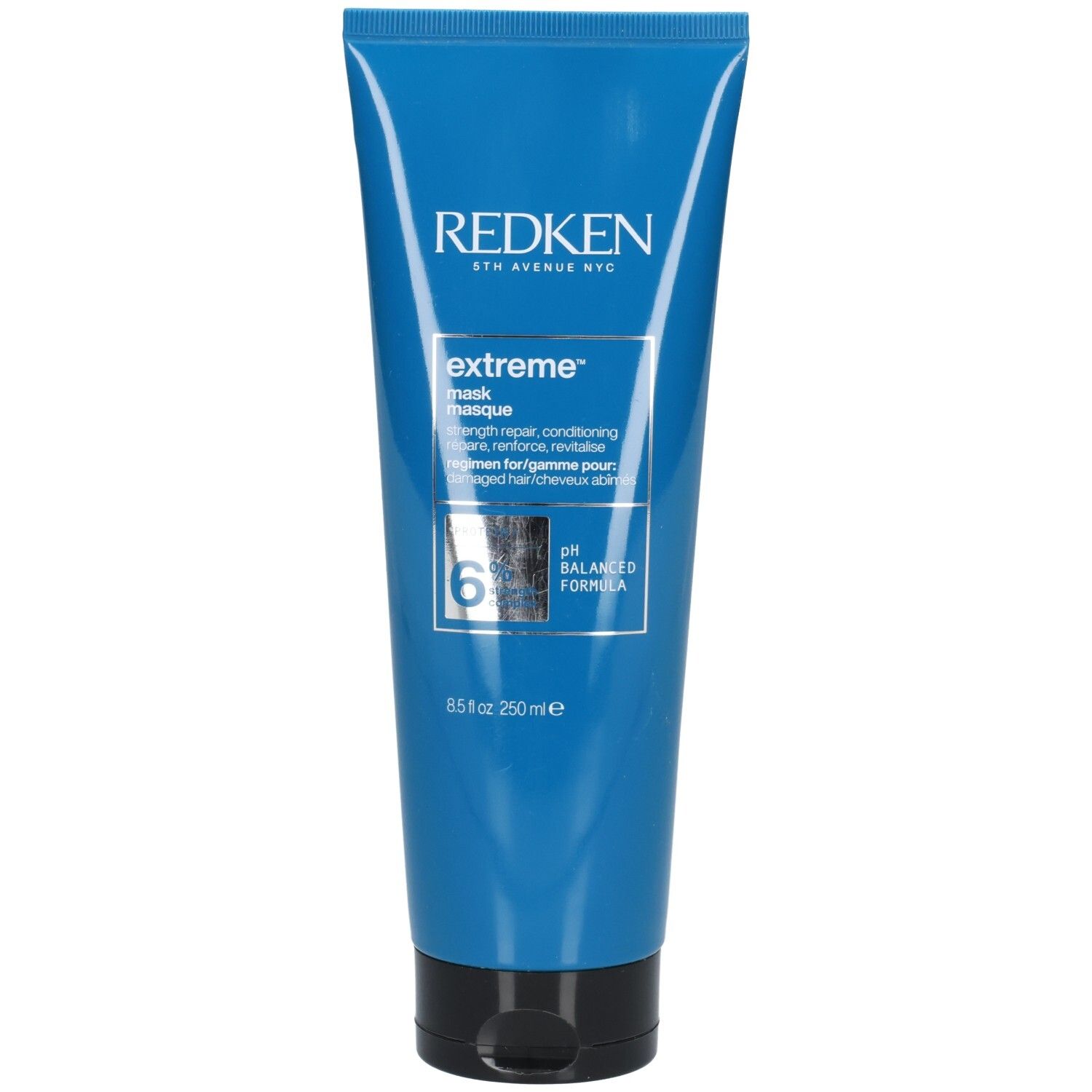 Tube bleue avec bouchon noir. Inscription: REDKEN, extreme mask, 8.5 fl oz 250 ml. pH Balanced Formula.
