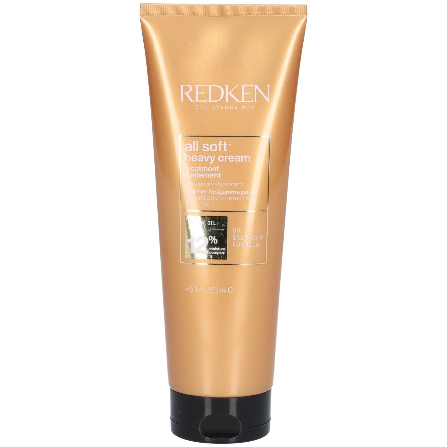 Tube dorée avec bouchon noir. Inscription: Redken, All Soft Heavy Cream. Traitement pour cheveux secs. 12% Moisture Complex.