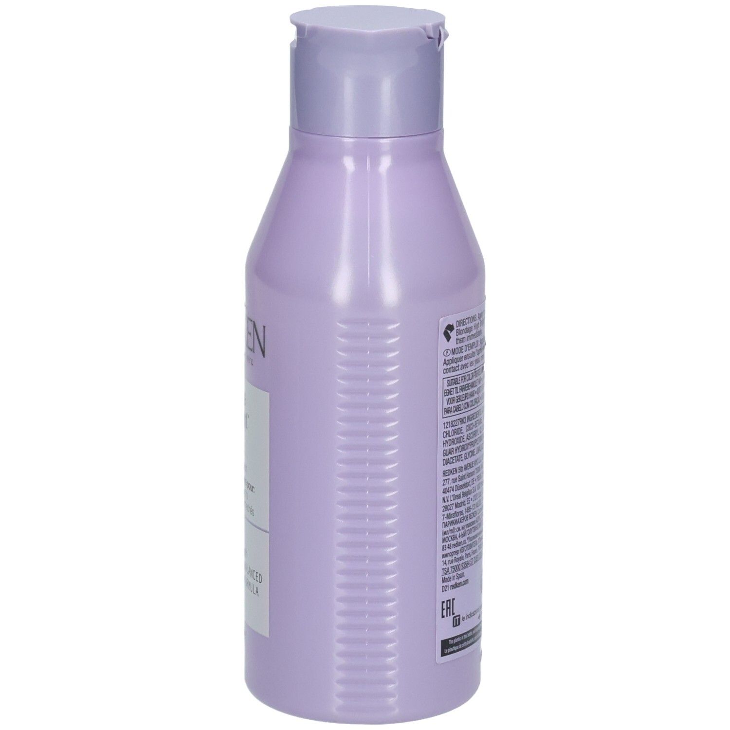 Côté du flacon de shampooing Redken Blondage High Bright. Flacon lilas avec texte. Étiquette avec ingrédients.