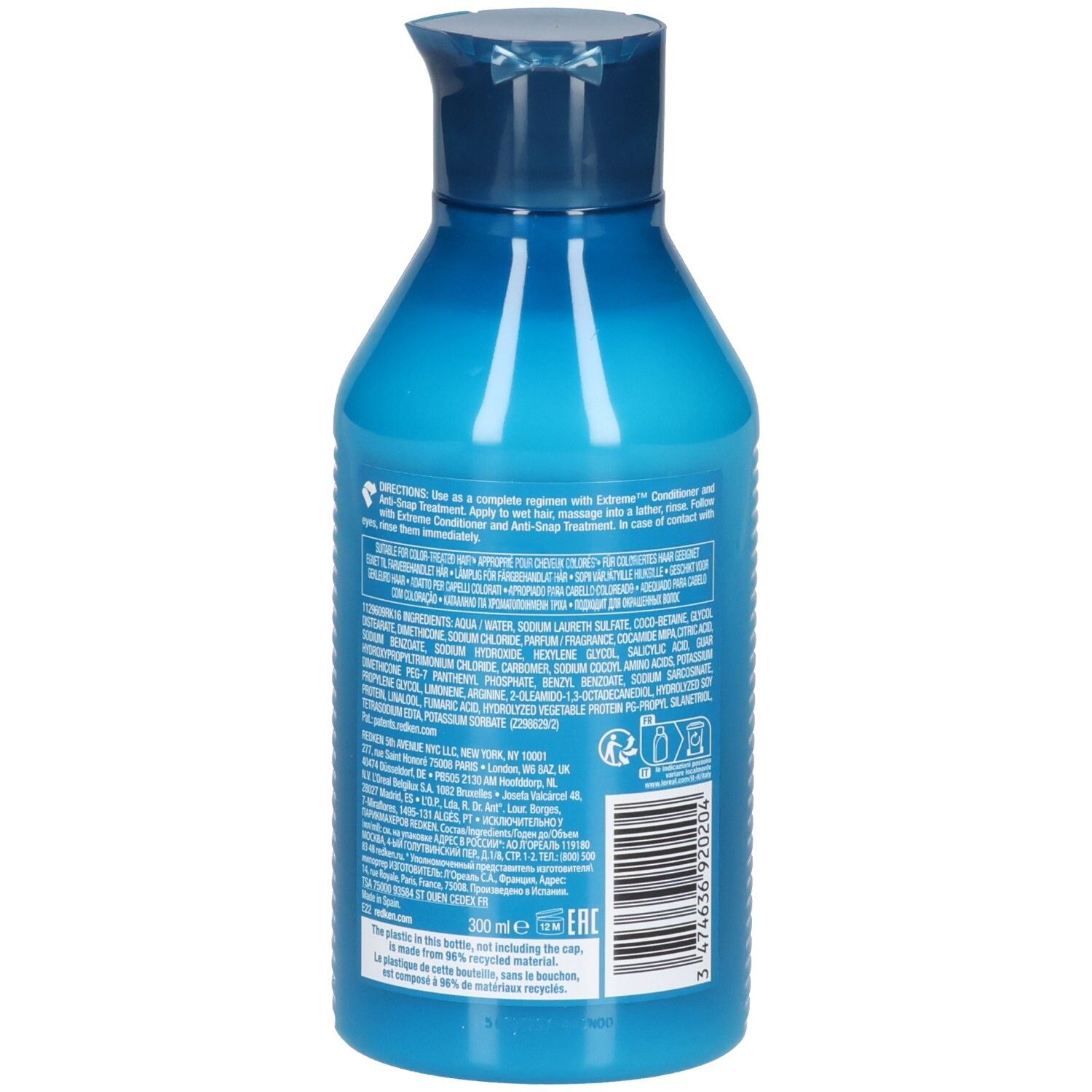 Dos d'un flacon de shampooing bleu. Texte: ingrédients, mode d'emploi, code-barres, 300 ml, matériau recyclé.