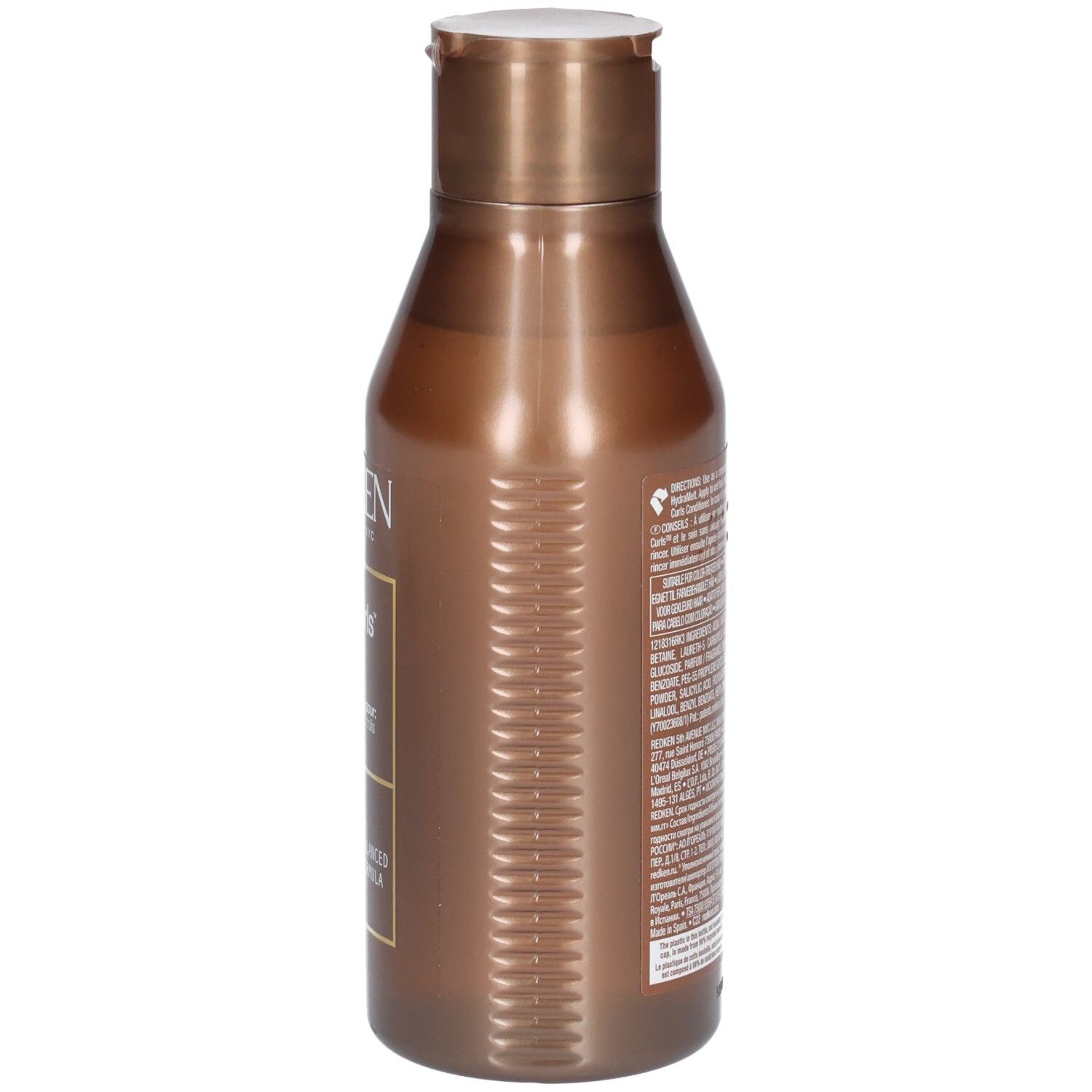 Flacon de shampooing marron, vue latérale. Texte au dos. Bouchon rabattable.