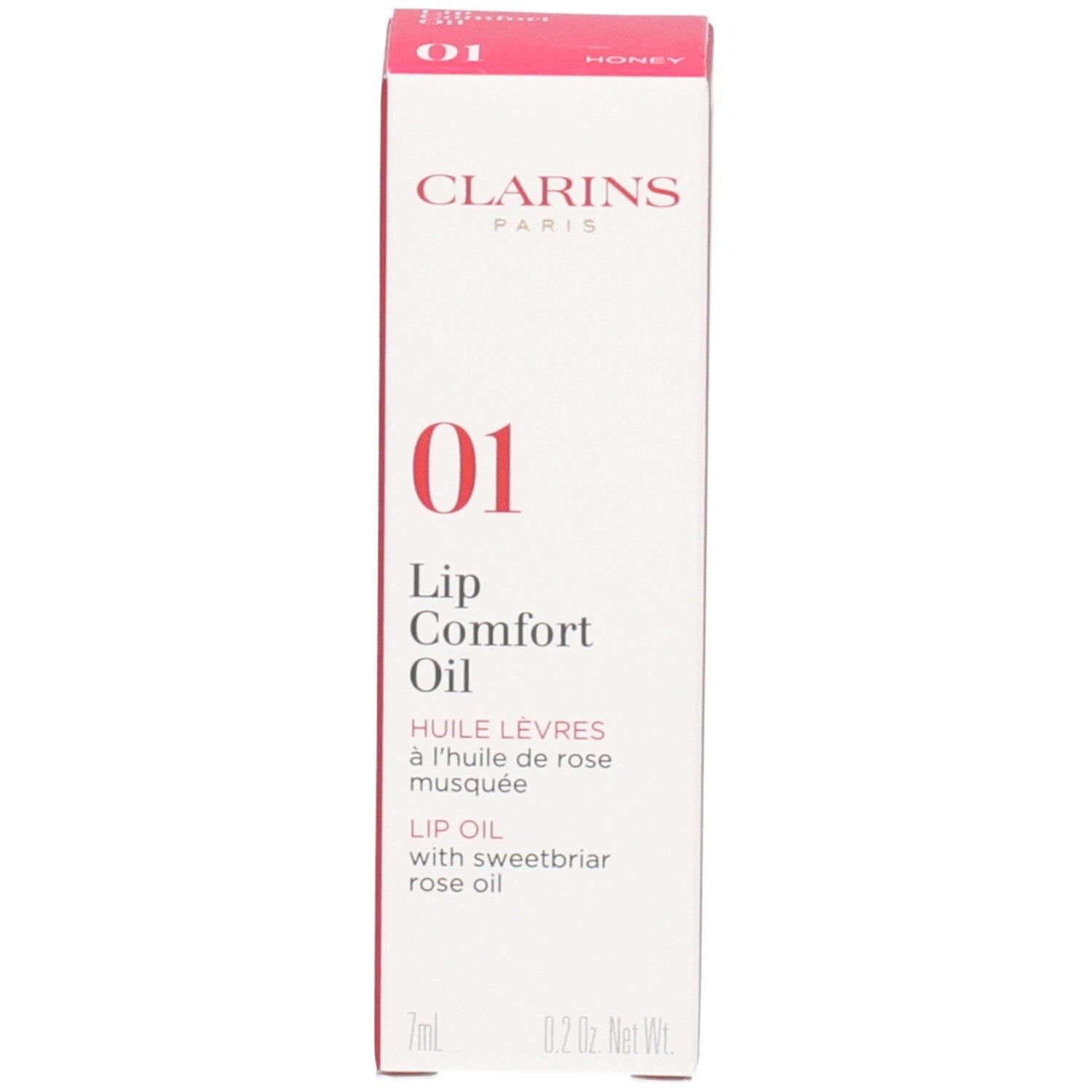 Clarins Lip Comfort Oil 01 - Honey et son emballage. Le flacon a un capuchon argenté.