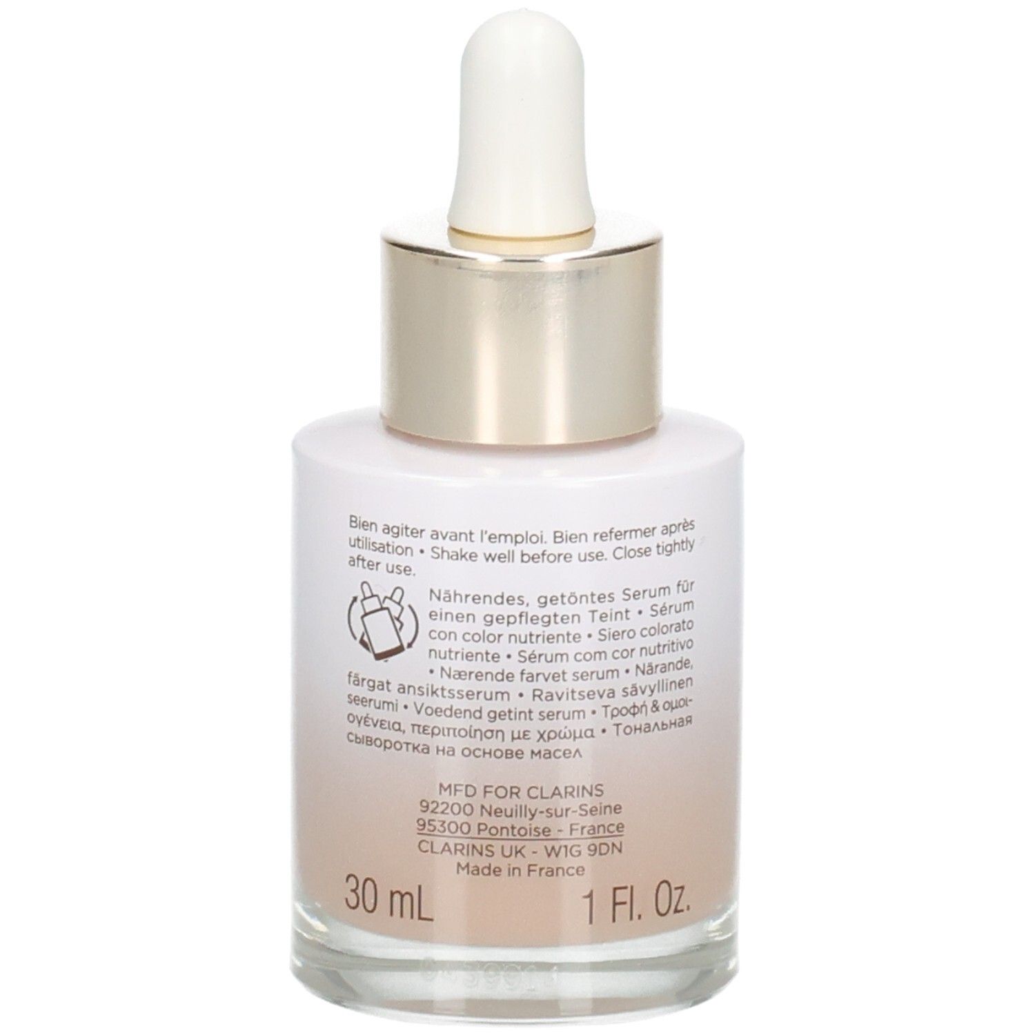 Flacon Clarins Tinted Oleo-Serum avec pipette, verso avec instructions d'utilisation et indication de volume 30ml.