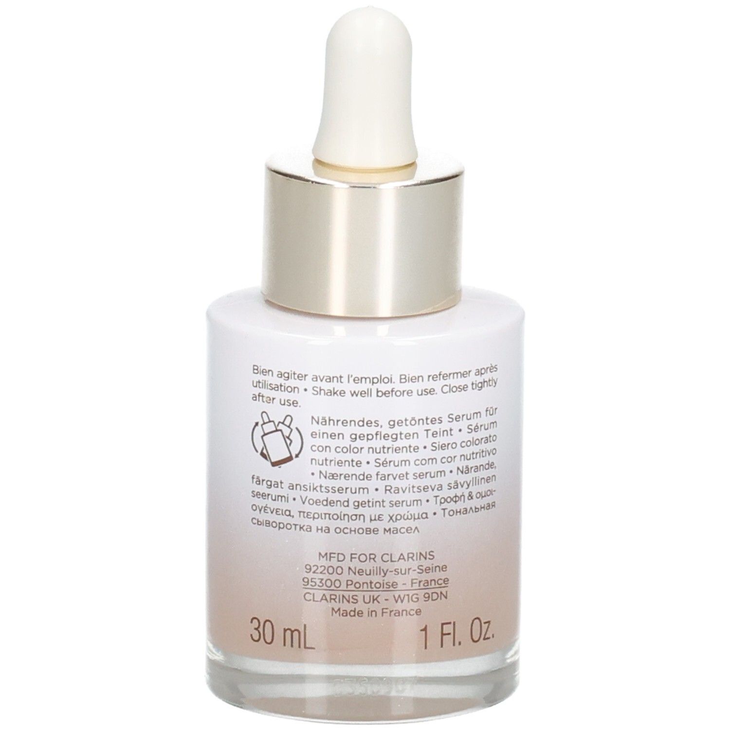 Flacon Clarins Tinted Oleo-Serum avec pipette, dos avec instructions d'utilisation et informations produit, 30ml, teinte 05.