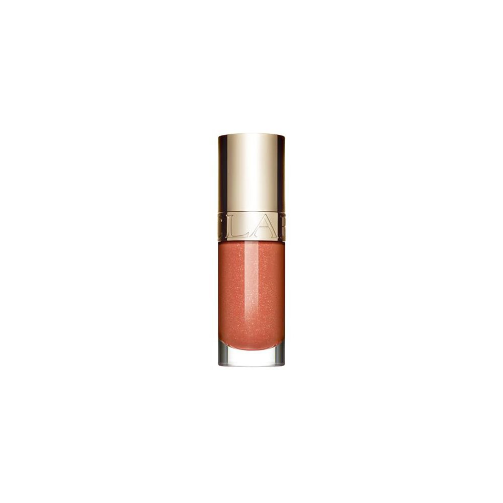 Flacon Clarins Lip Comfort Oil avec bouchon doré sur fond blanc.