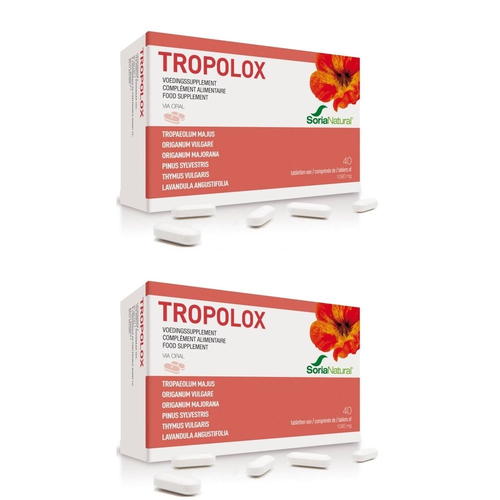 Deux boîtes de Tropolox, Soria Natural. Des comprimés blancs sont disposés devant les boîtes.