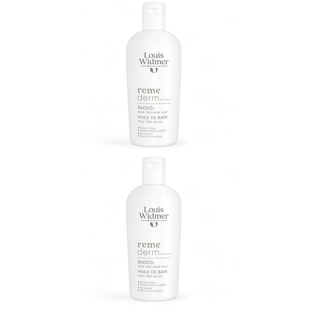 Deux flacons d'huile de bain Louis Widmer Remederm pour peau sèche. Flacons blancs avec bouchon rabattable, nom du produit.