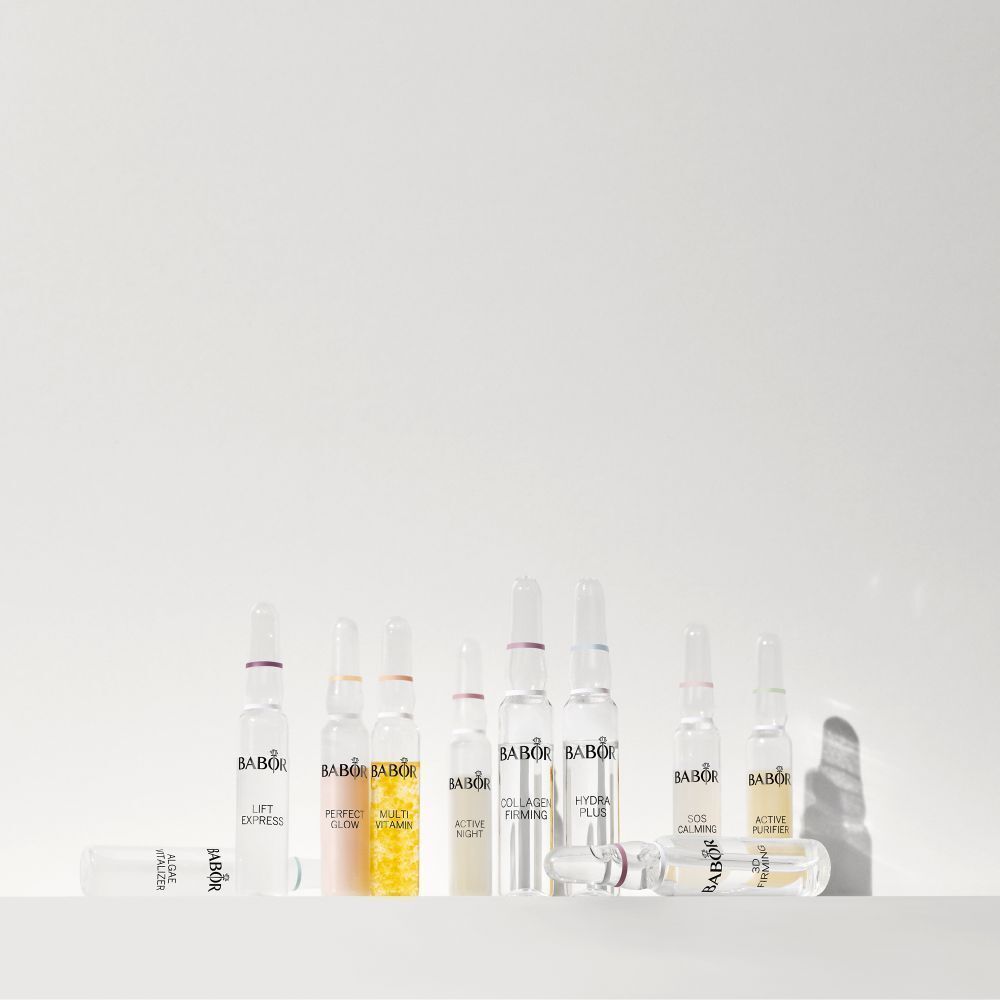 Diverses ampoules Babor sur une surface blanche. Certaines ampoules sont étiquetées : Lift Express, Hydra Plus, etc.