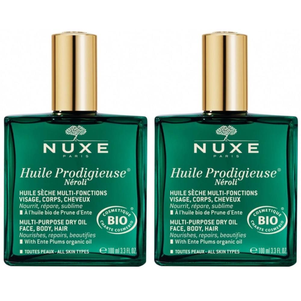 Deux flacons verts avec bouchons dorés. Inscription : NUXE Huile Prodigieuse® Neroli Bio. Huile sèche multi-fonctions.