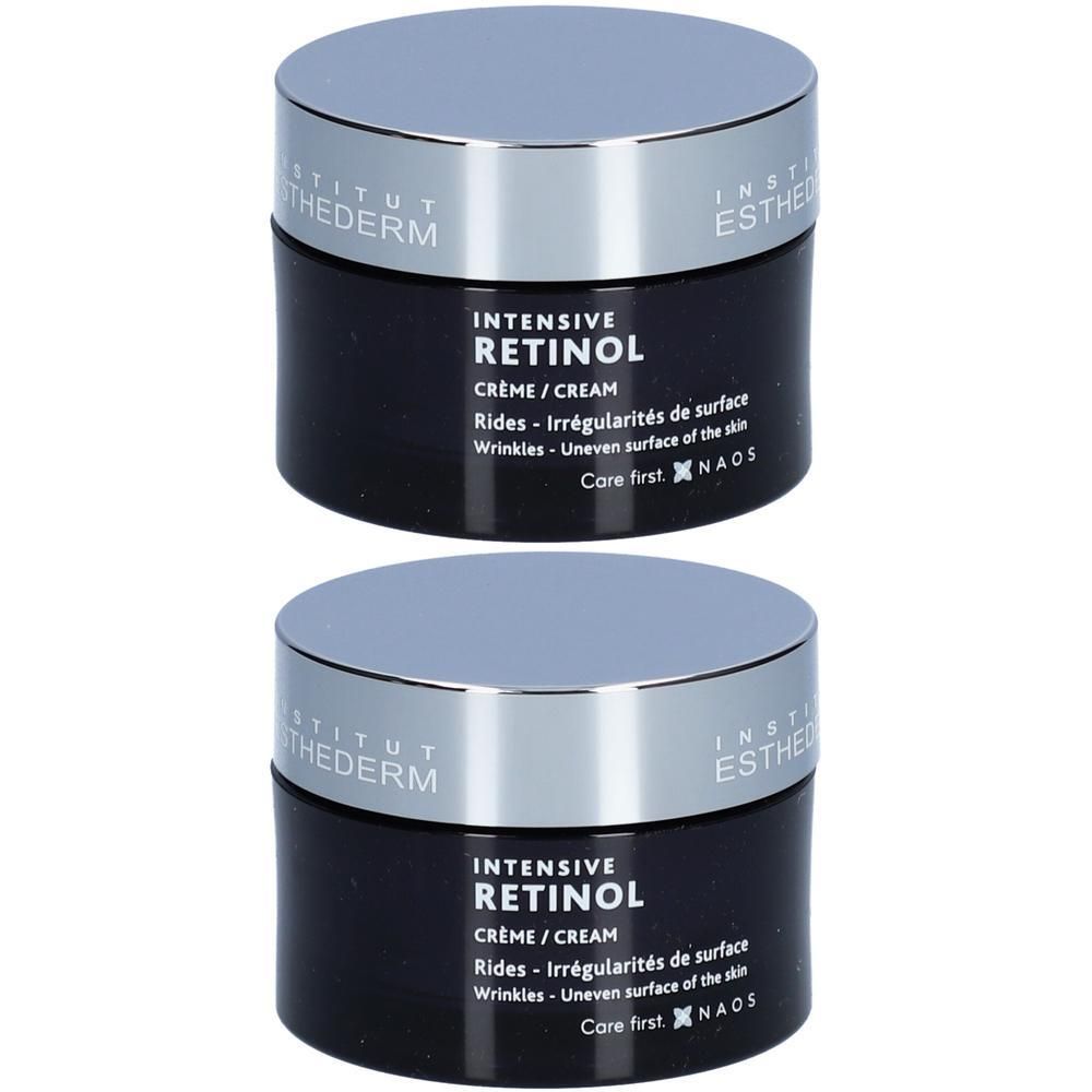 Deux pots noirs avec couvercles argentés. Inscription: INSTITUT ESTHEDERM, INTENSIVE RETINOL Crème/Cream.