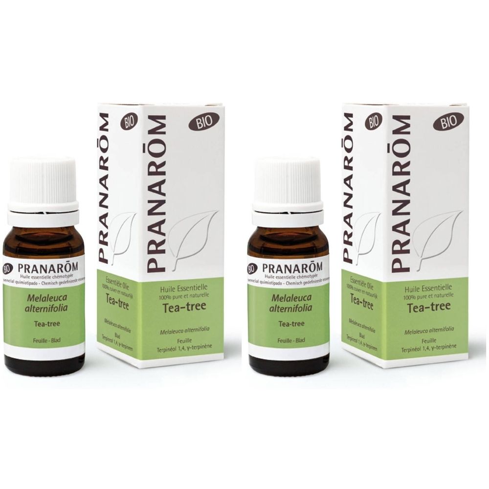 Deux flacons et deux boîtes. Inscription : Pranarôm, Tea-tree, Bio. Cercle jaune avec "1+1".