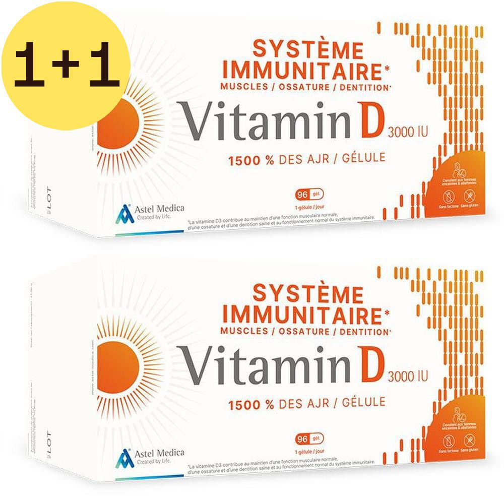 Deux boîtes de Vitamine D Astel Medica. Inscription: Vitamine D 3000 UI, 1500% des AJR. Contient 90 gélules. Logo soleil orange.