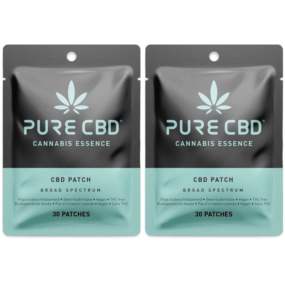 Deux paquets de Pure CBD Patches. Sachets noirs avec bande turquoise. Inscription : Pure CBD, Cannabis Essence, CBD Patch, 30 Patches.