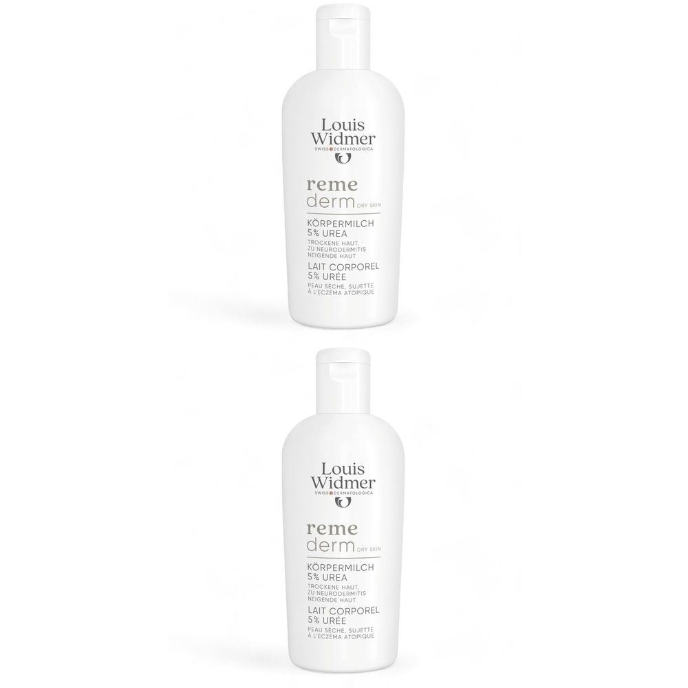 Deux flacons blancs Louis Widmer Remederm. Inscription: Lait corporel 5% urée. Pour peau sèche, sujette à l'eczéma atopique.
