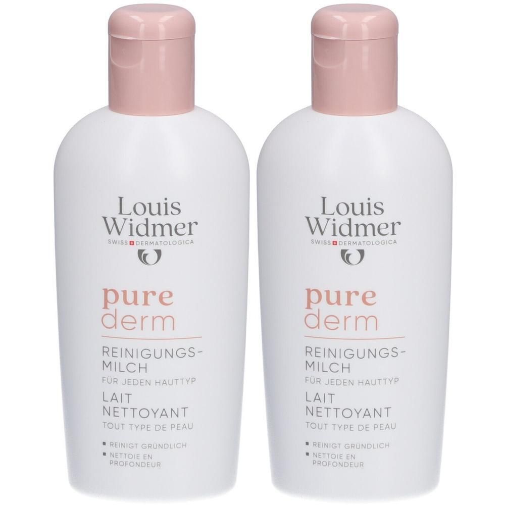 Deux flacons de Louis Widmer Purederm Lait nettoyant. Flacons blancs avec bouchons roses. Texte: pure derm, Reinigungsmilch, Lait nettoyant.