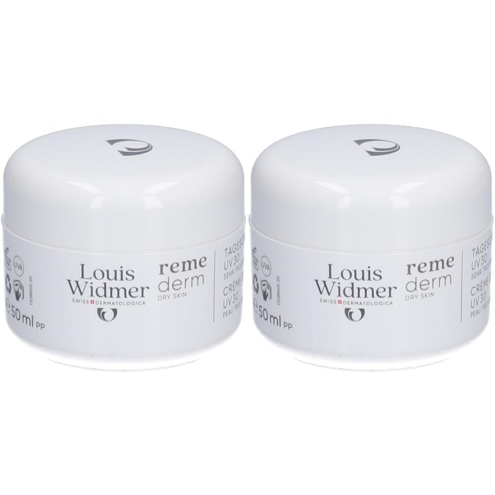 Deux pots de crème blancs avec logo Louis Widmer et inscription Remederm. Inscription: Crème de jour UV30. 50ml.