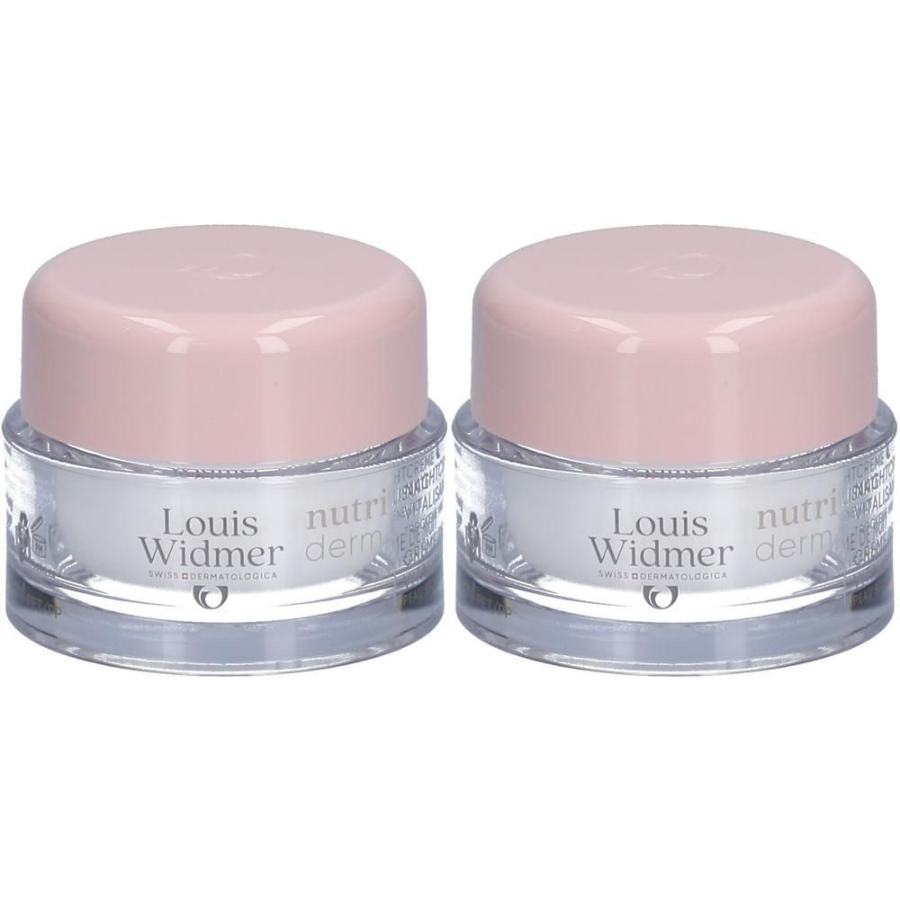 Deux pots de crème de nuit Louis Widmer Nutriderm. Récipients en verre avec couvercles roses. Inscription: Louis Widmer, Nutriderm, Crème de nuit.