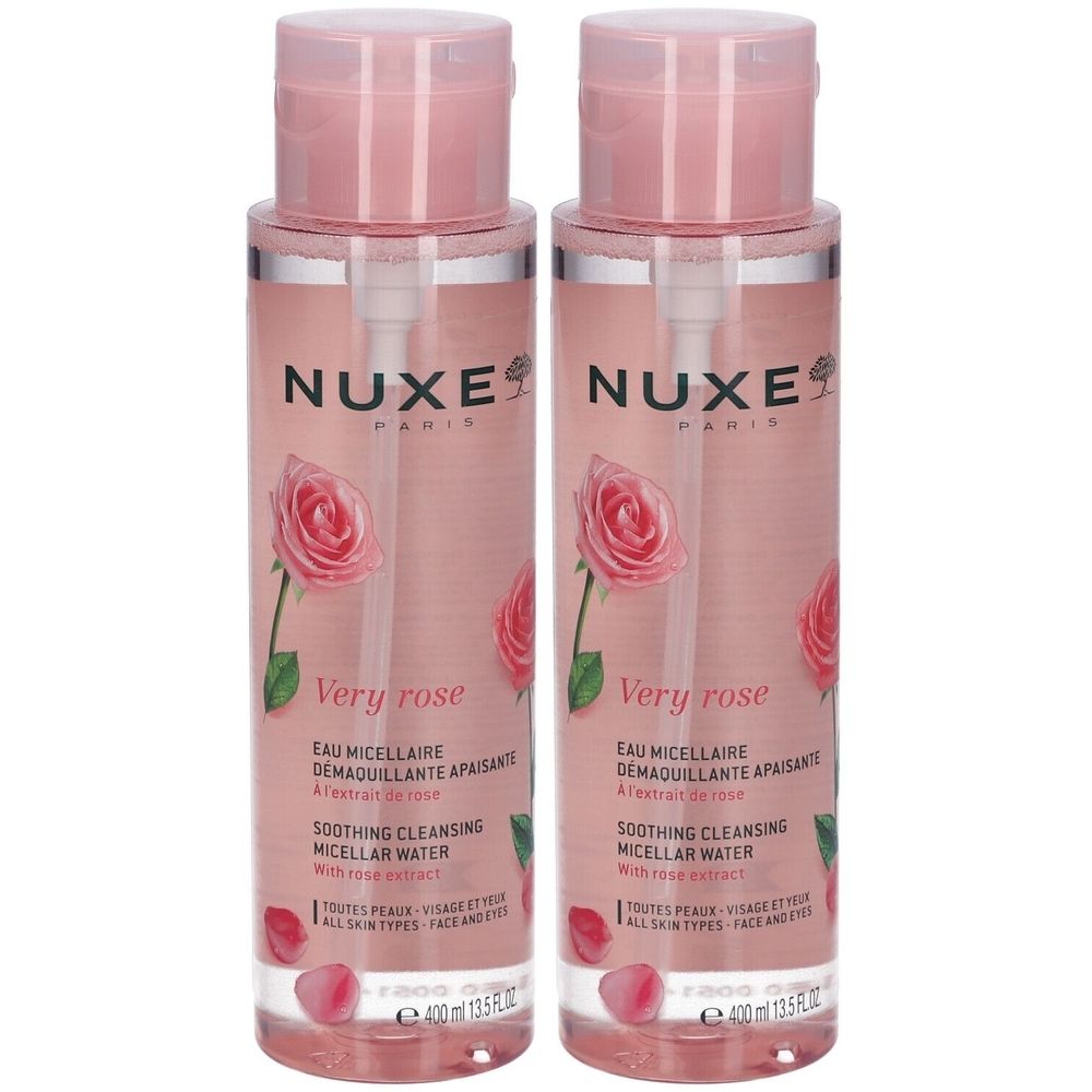 Deux flacons de Nuxe Very Rose. Liquide rose, bouchon rose avec pompe. Étiquette avec rose et texte.