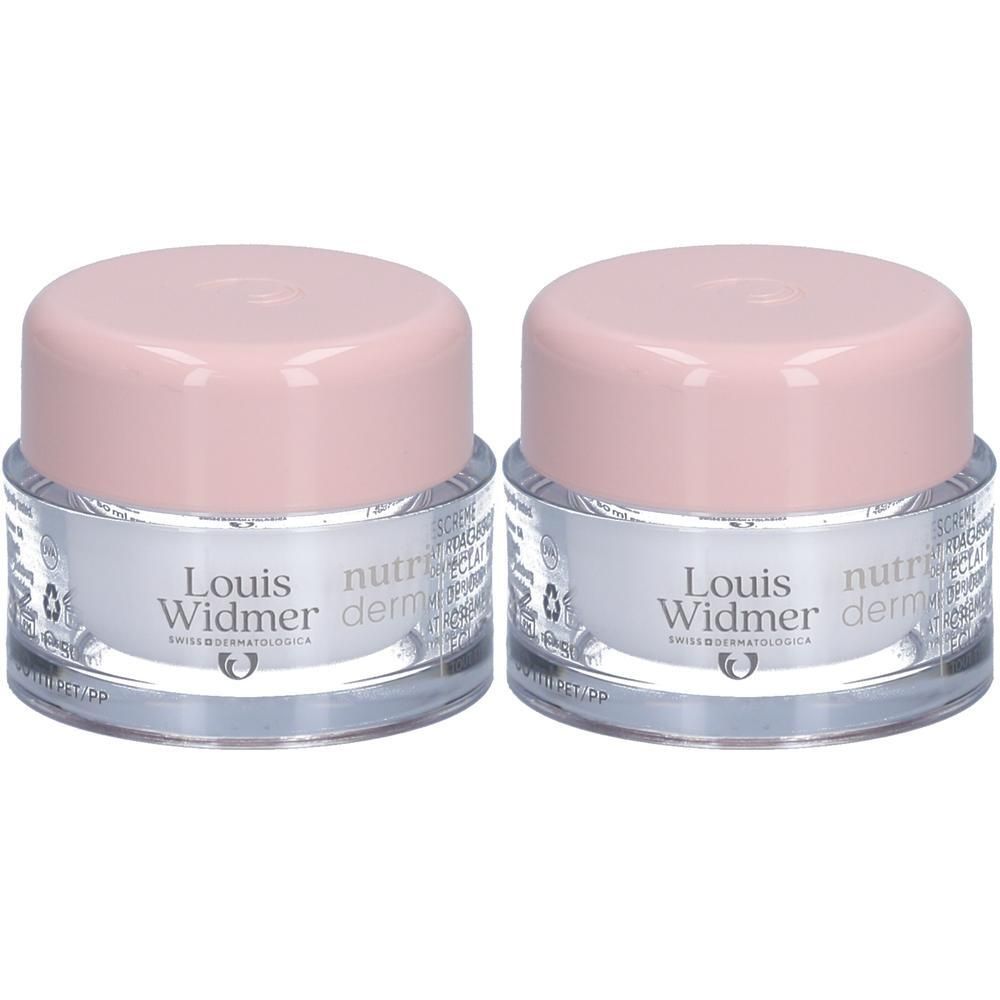 Deux pots de crème Louis Widmer Nutriderm avec couvercles roses. Inscription: Nutriderm, Swiss Cosmetic.