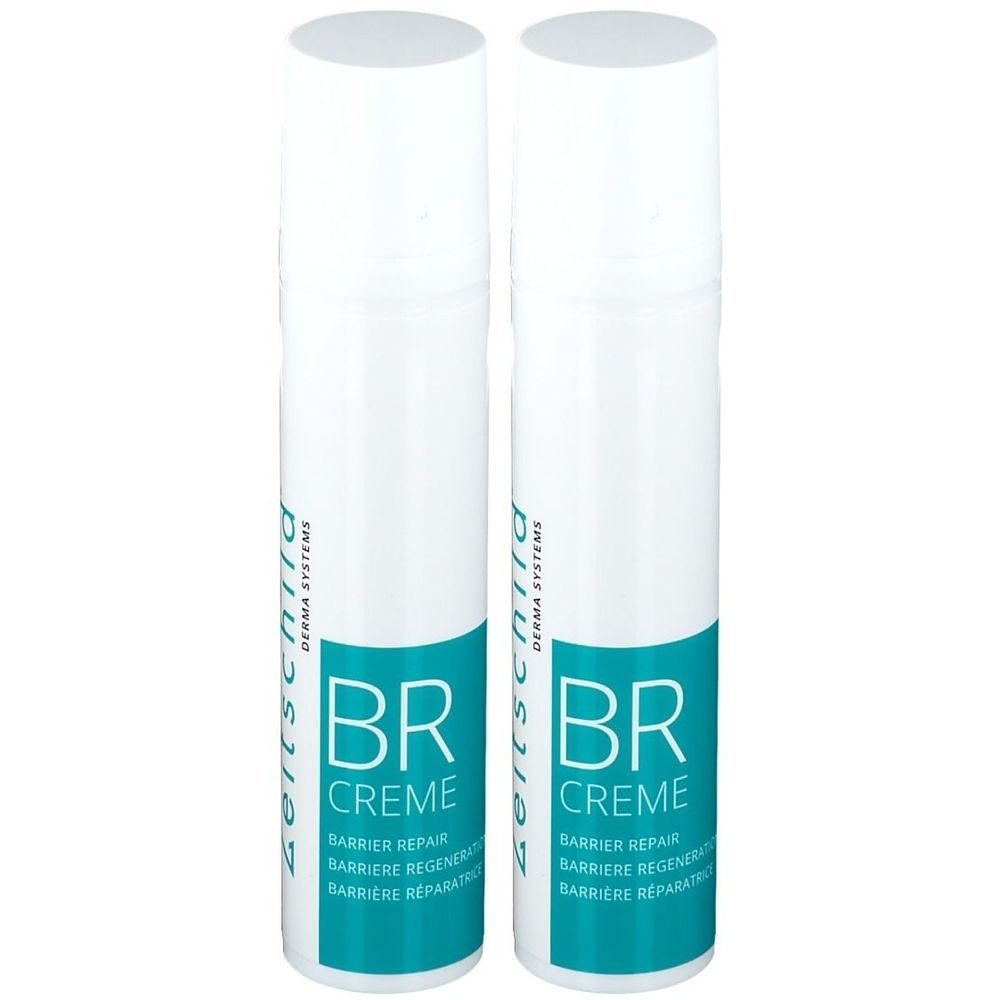 Deux flacons pulvérisateurs blancs avec étiquette bleue. Inscription: BR Crème, Réparation Barrière. Logo Zeitschild Derma Systems.