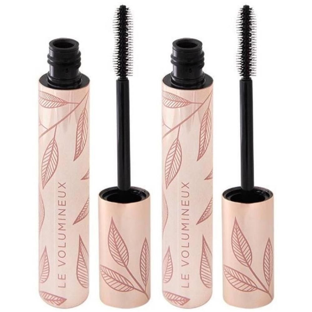 Deux mascaras ouverts. Tubes roses avec motif de feuilles et inscription "LE VOLUMINEUX". Brosses noires.