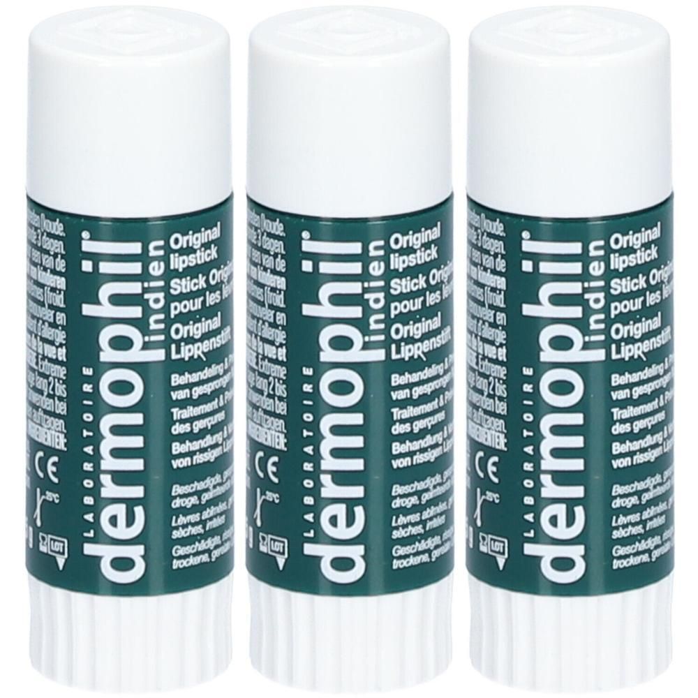 Trois sticks pour les lèvres avec bouchon blanc. Étui vert imprimé avec le texte "Dermophil Indien".