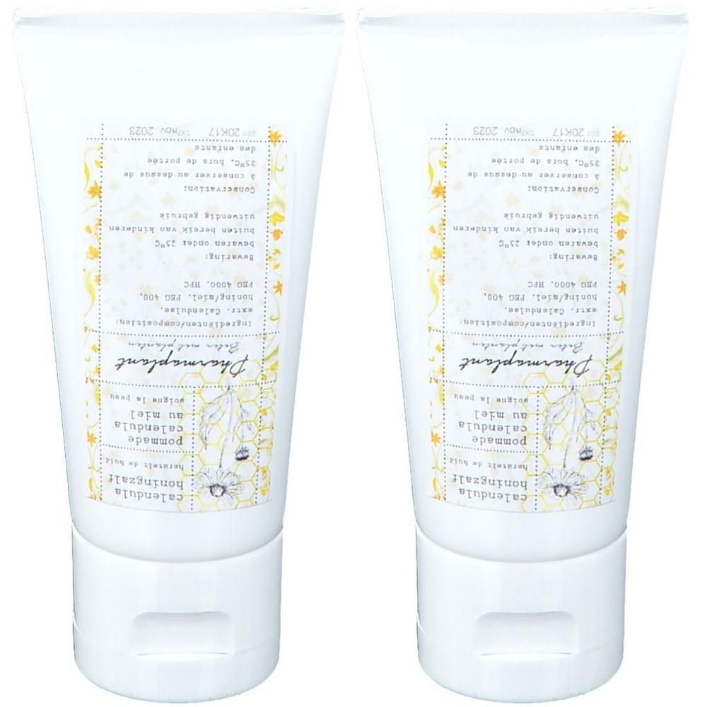 Deux tubes de Pommade calendula au miel Pharmaplant. Tubes blancs avec étiquette. Texte en français et néerlandais.