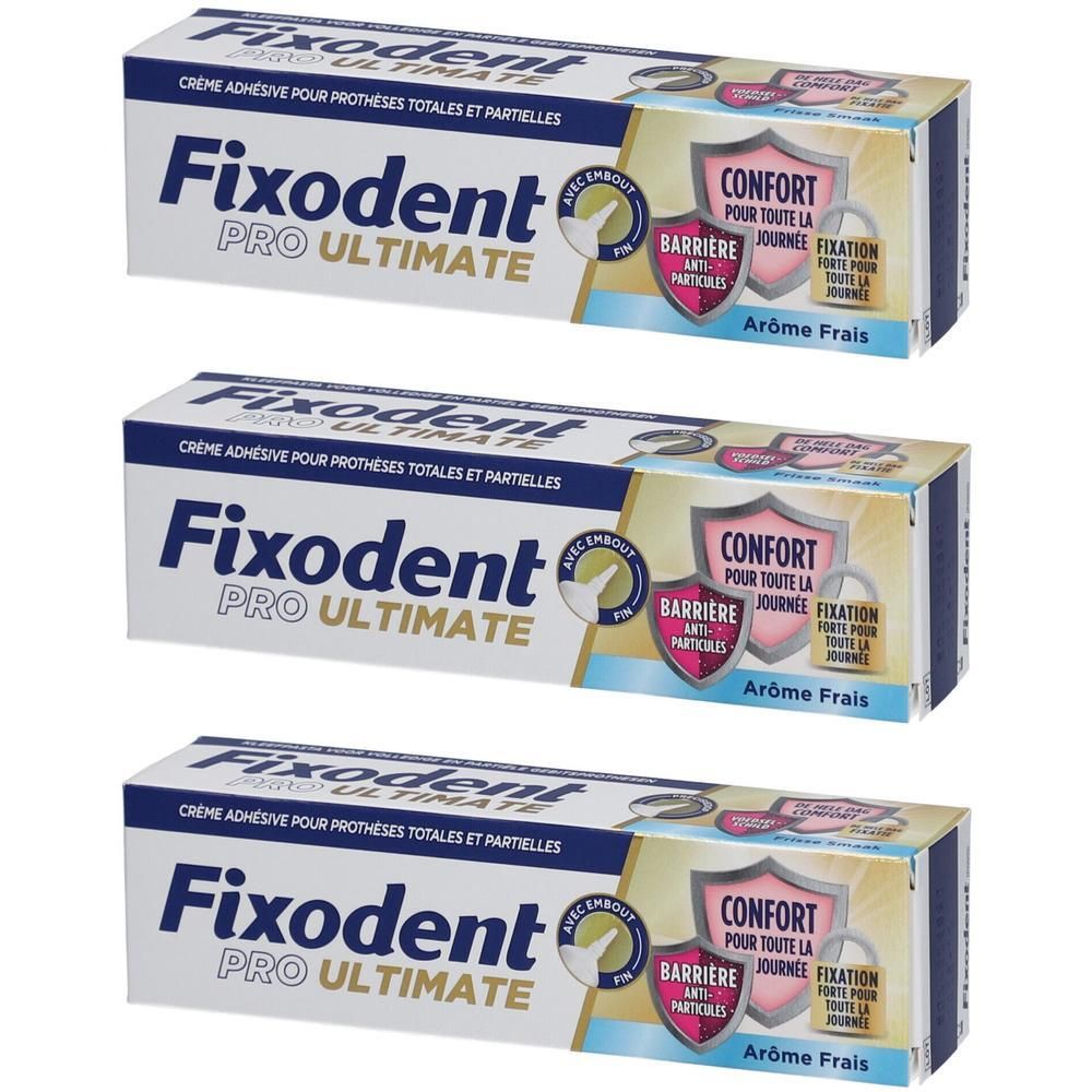 Trois boîtes de Fixodent Pro Ultimate. Tubes blancs avec texte bleu et emballage carton. Texte: Crème adhésive pour prothèses.