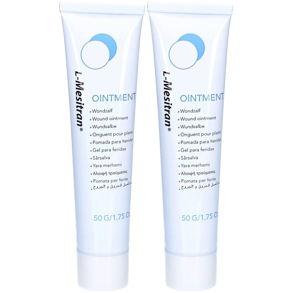 Deux tubes de L-Mesitran Ointment. Tubes blancs avec cercles bleus et désignations de produits en plusieurs langues. 50 G.