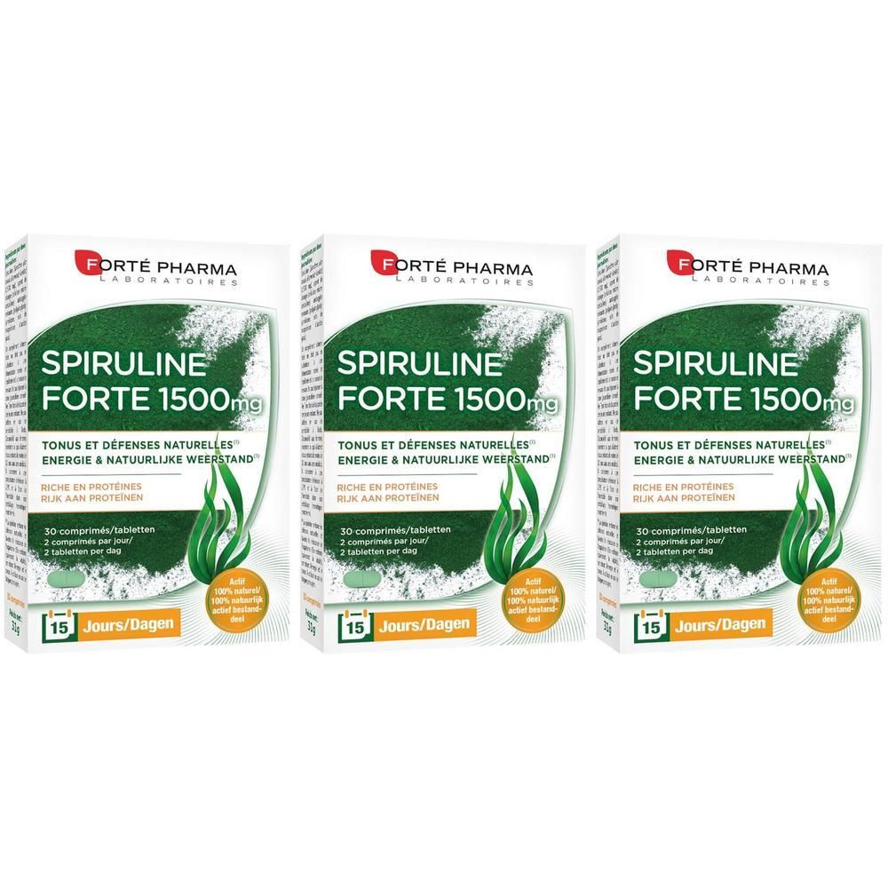 Trois boîtes de Forté Pharma Spirulina 1500 mg. Emballage blanc avec texte et logo verts. Contient 30 comprimés.