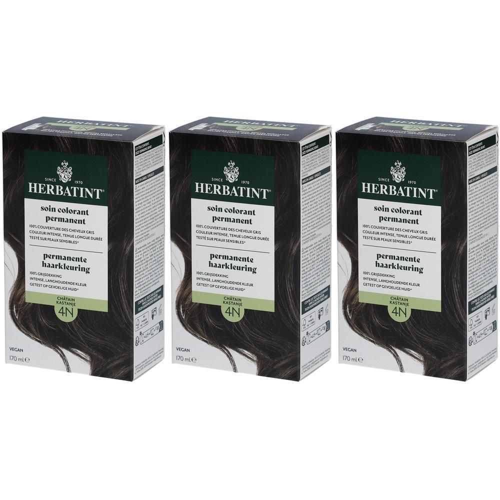 Trois boîtes de Herbatint soin colorant permanent 4N châtain. Emballage vert et blanc avec nom du produit et couleur de cheveux.