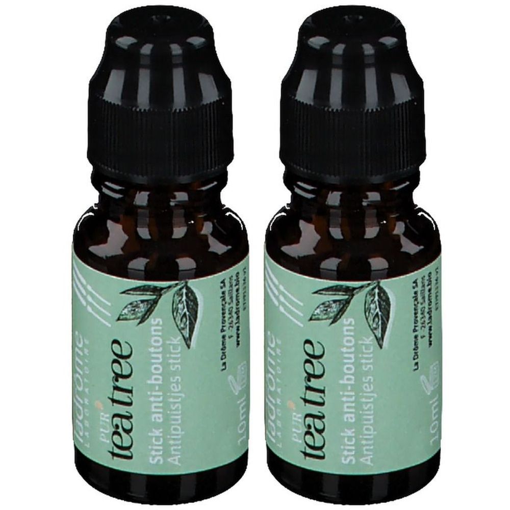 Deux flacons avec bouchon noir et étiquette. Inscription: tea tree stick anti-boutons. 10ml.