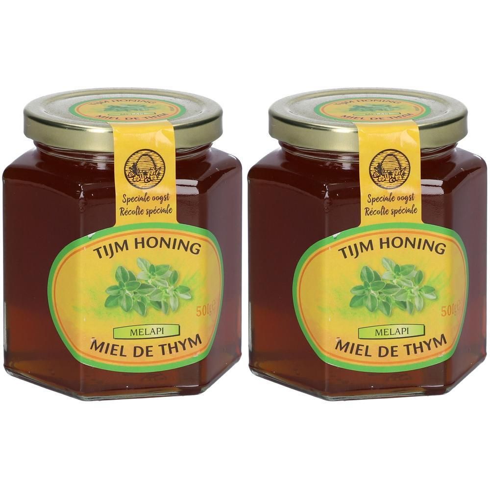 Deux pots de miel de thym. Forme hexagonale, couvercle doré, étiquette jaune avec motif végétal et texte.