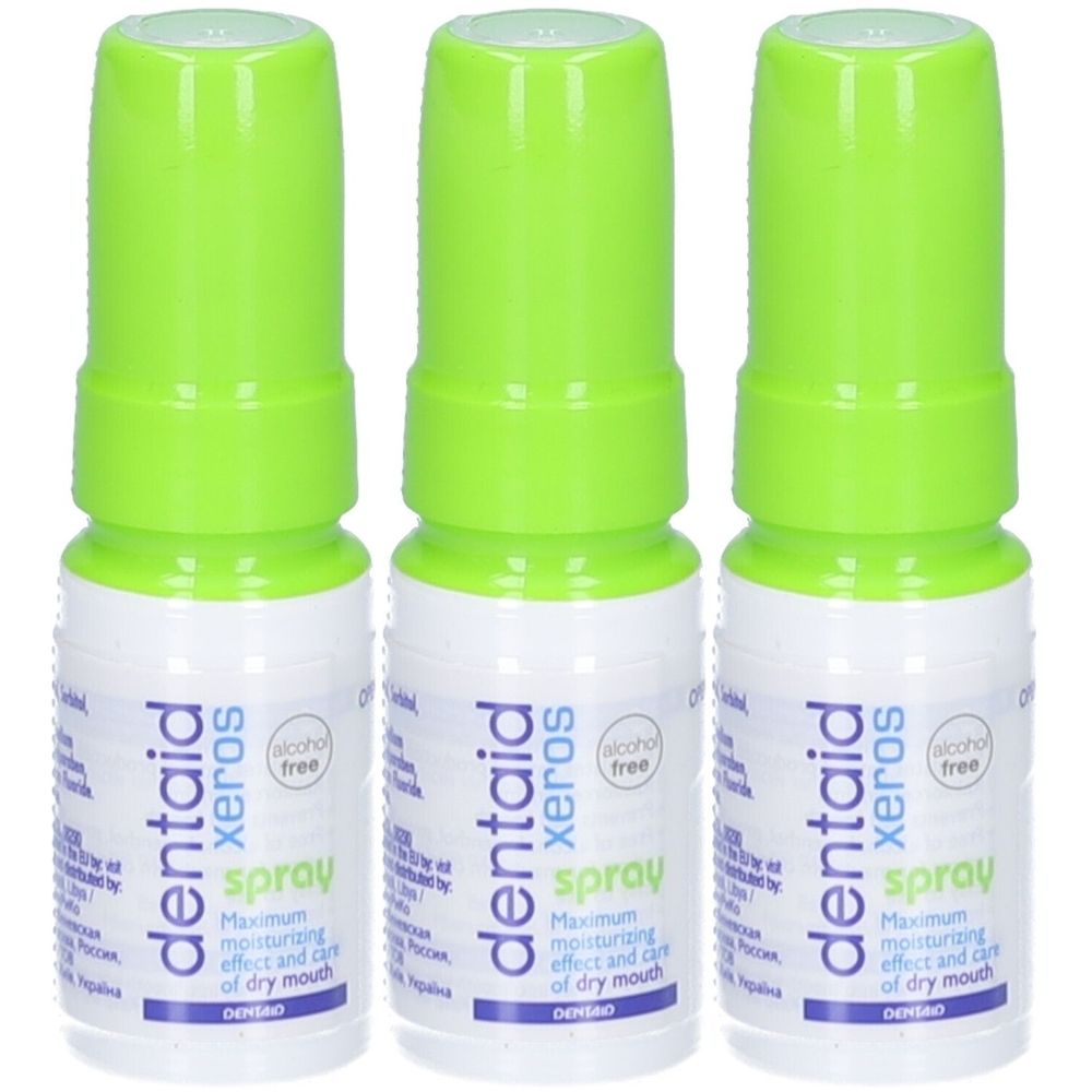 Trois flacons spray avec bouchons verts. Inscription: Dentaid Xeros spray, sans alcool. Texte bleu et vert.