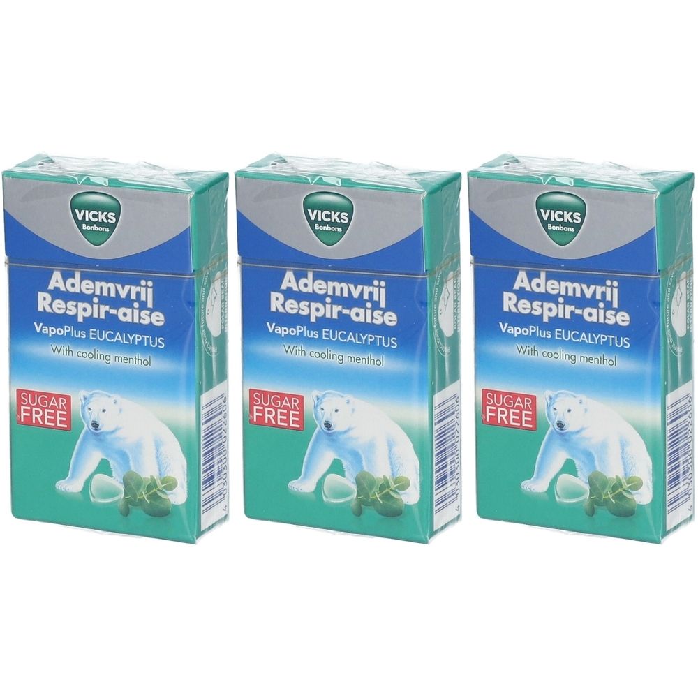 Trois boîtes Vicks Respirer Librement Sans Sucre. Emballage bleu et vert avec illustration d'ours polaire et texte.