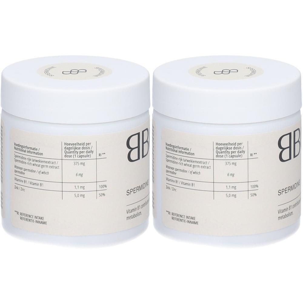 Deux pots blancs avec couvercles. Inscription BBODY et SPERMIDIN. Étiquette avec informations nutritionnelles et vitamine B1.