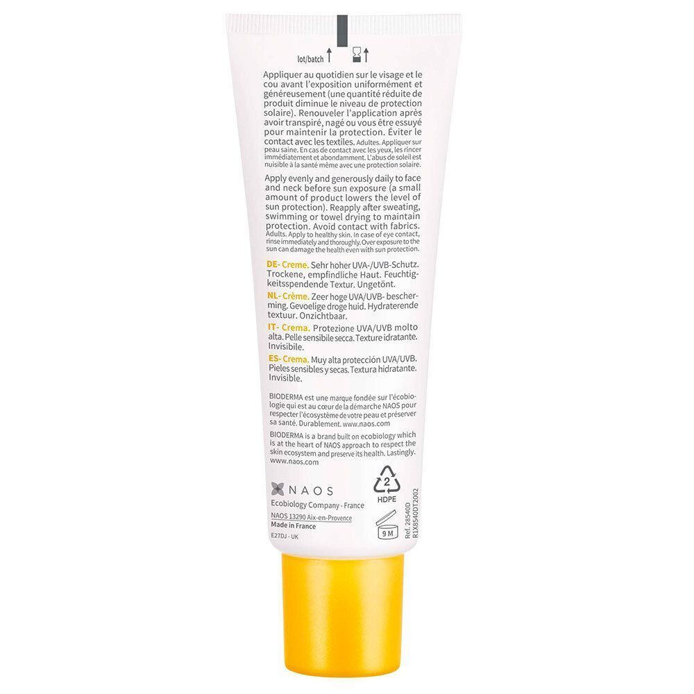 Dos d'un tube de BIODERMA Photoderm Crème. Texte en plusieurs langues, dont le français. Bouchon jaune.