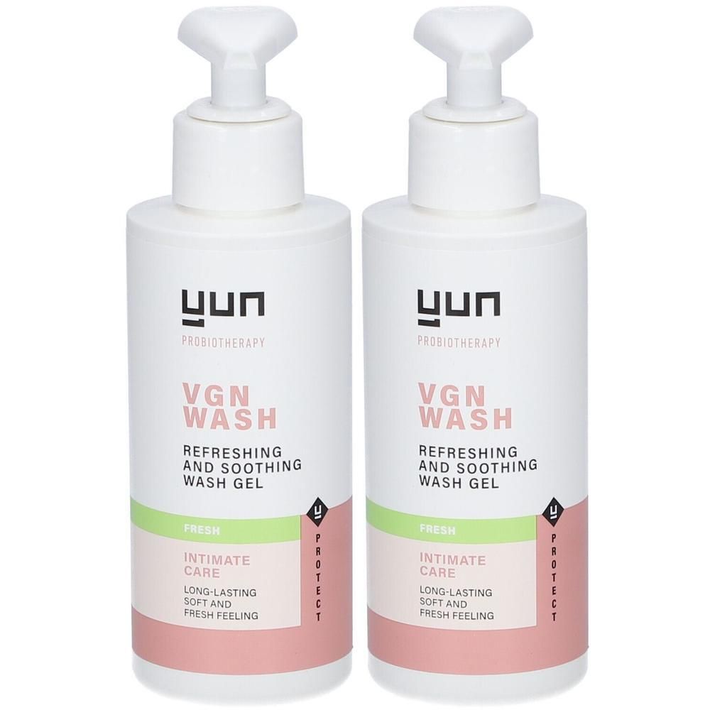 Deux flacons de YUN VGN WASH. Flacons blancs avec pompe. Inscription : VGN WASH, Fresh, Intimate Care.