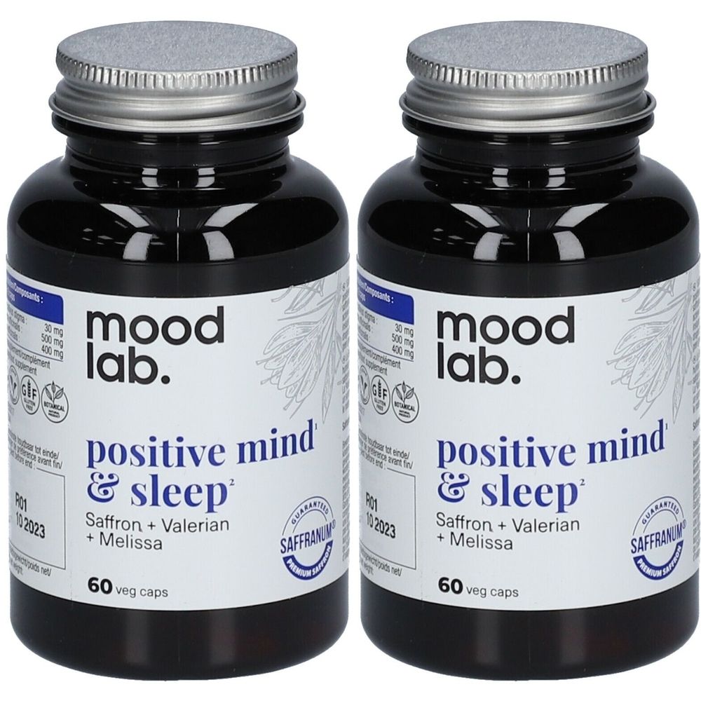 Deux flacons de MOODLAB, positive mind & sleep. Bouteilles en verre noir avec couvercles argentés et étiquettes d'informations.