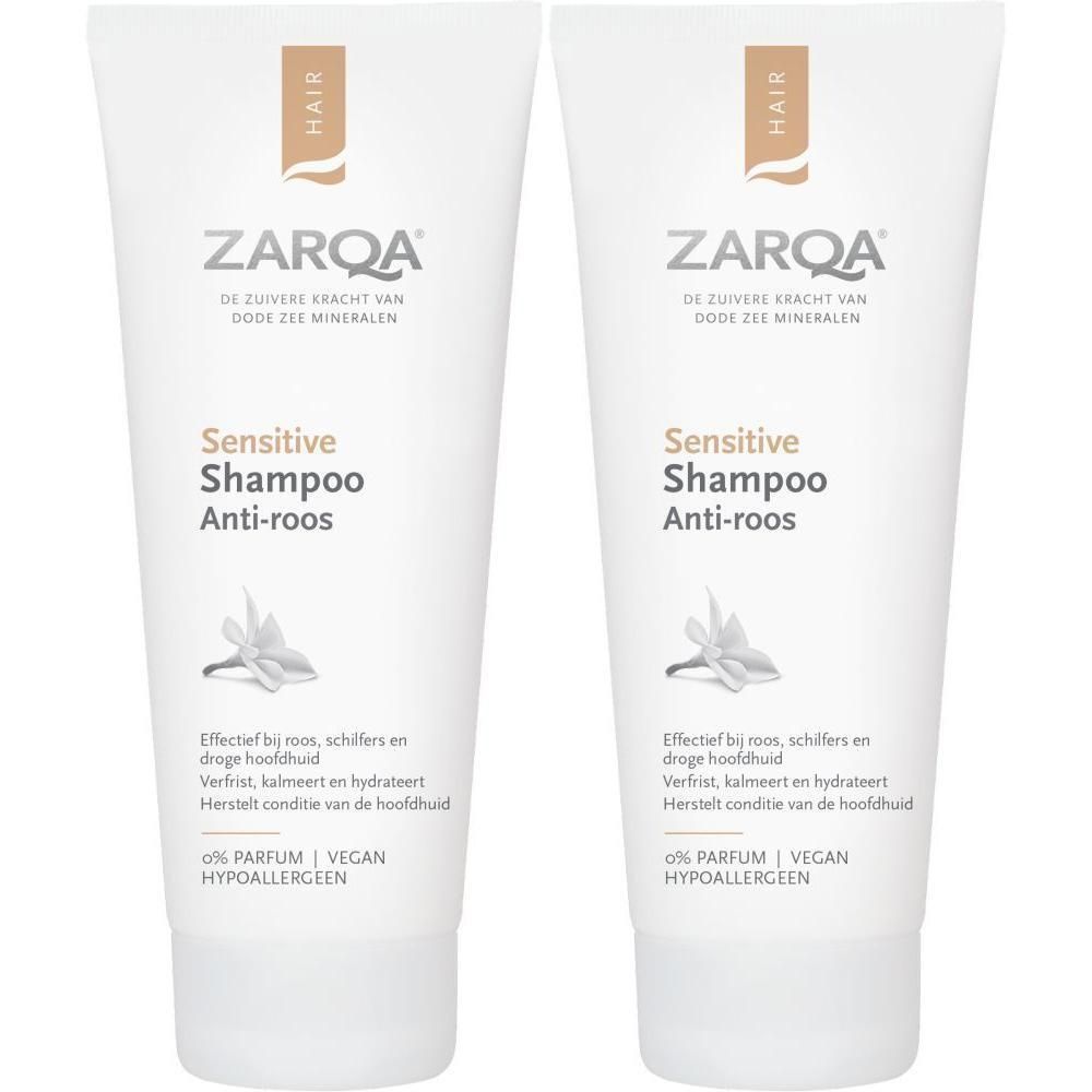 Deux tubes de shampooing antipelliculaire ZARQA Sensitive. Tubes blancs avec texte et logo. Nom du produit et informations.