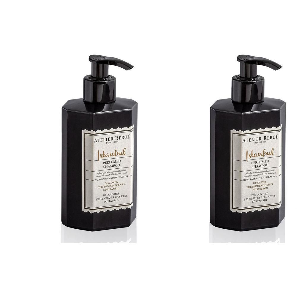 Deux flacons noirs avec pompe doseuse. L'étiquette indique "ATELIER REBUL Istanbul Shampooing Parfumé".